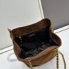 6930b47b6e68136f4d9adc87 Vintage Prada Suede Crossbody Bag with Chain – A Timeless 'Baozi' Design