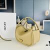 6930b4e16e68136f4d9add4e Prada's New Bag Design: A Stylish Choice for Summer
