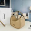6930b4e56e68136f4d9add59 Prada's New Bag Design: A Fresh Take for Summer with Versatile Styling