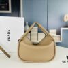 6930b4e66e68136f4d9add5b Prada's New Bag Design: A Fresh Take for Summer with Versatile Styling