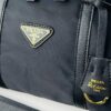 6930b4f06e68136f4d9add71 Prada Re-Edition 1978 Medium Size Recycled Nylon and Saffiano Leather Handbag with Box | Official Website Image! Store Display