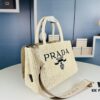 6930b4f56e68136f4d9add7b Prada Beautiful Wicker Basket Bag – A Charming Summer Essential with Straw and Leather Design