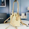 6930b5506e68136f4d9ade3e Prada Raffia Woven Bucket Bag with Box
