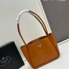 6930b5636e68136f4d9ade61 Prada Mini Tote Bag 24 New Arrival, Often Called the 'Little Vegetable Basket', Made of Cow Leather with Triangle Logo, Minimalist Design, Comes with Box