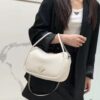 6930b5786e68136f4d9ade8a Prada's New Bag Design: A Fresh Take for Summer