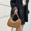 6930b5796e68136f4d9ade8b Prada's New Bag Design: A Fresh Take for Summer