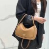 6930b58e6e68136f4d9adeb0 Prada's New Bag Design: A Fresh Take for Summer
