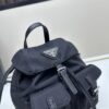6930b6be6e68136f4d9ae0b1 Prada Silver Logo Parachute Backpack – A Lifetime Companion