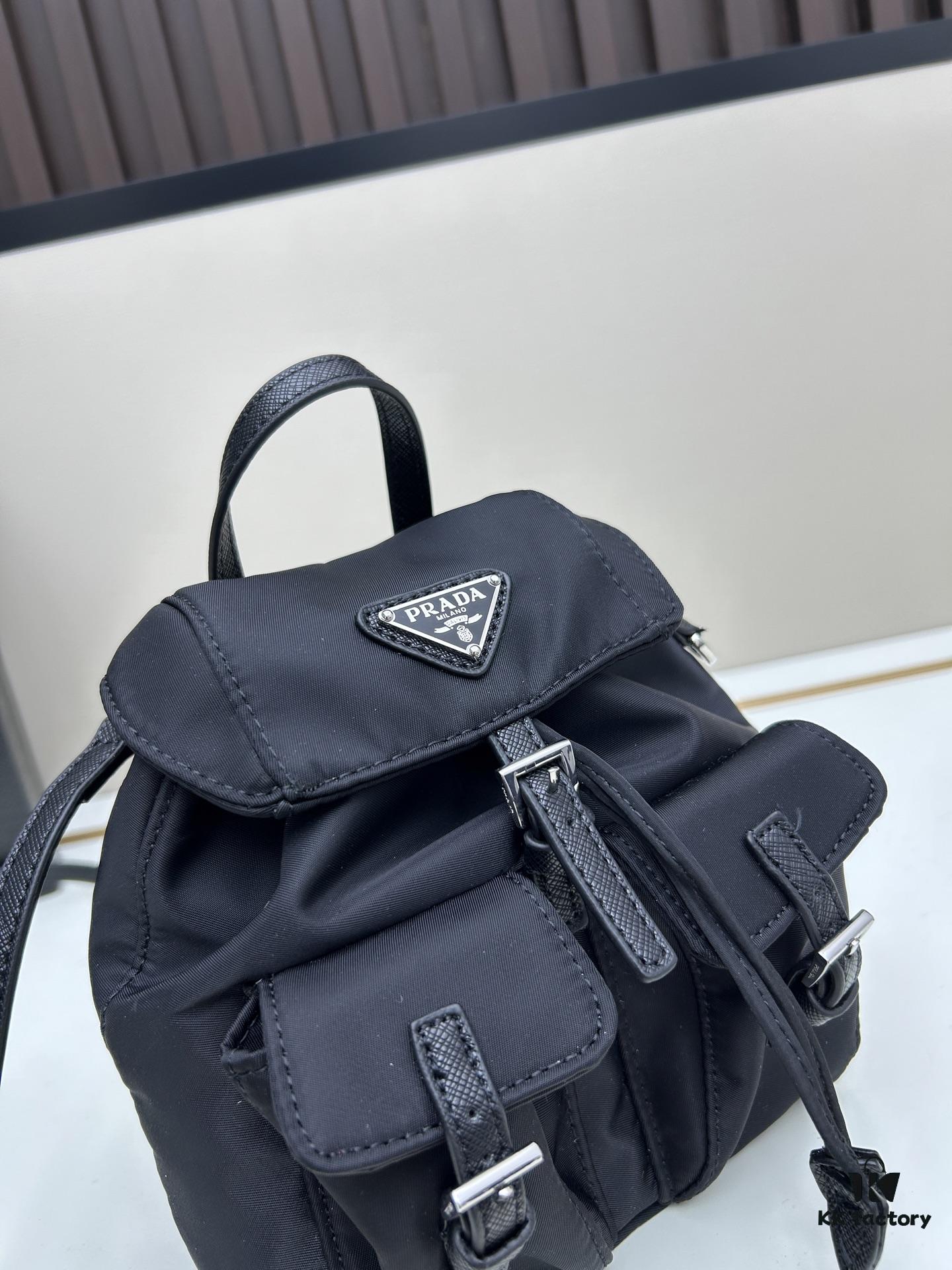 6930b6be6e68136f4d9ae0b1 Prada Silver Logo Parachute Backpack – A Lifetime Companion