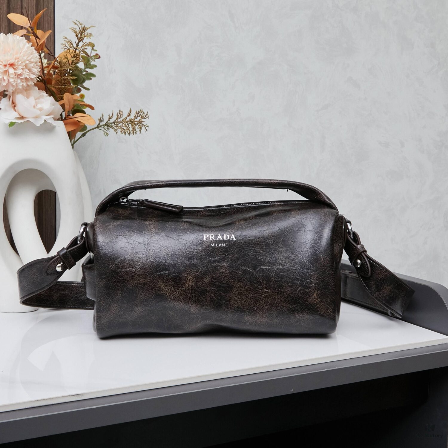 6930b6d86e68136f4d9ae0d5 PRADA 25 Runway Edition Unisex Distressed Wax Leather Boston Bag