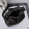6930b6e06e68136f4d9ae0e2 PRADA 25 Runway Edition Unisex Distressed Wax Leather Boston Bag