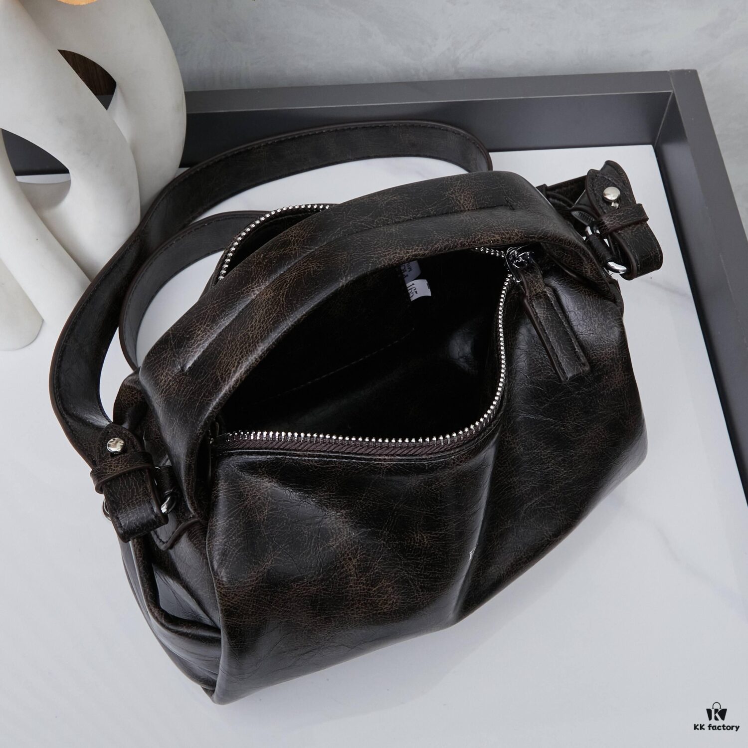 6930b6e06e68136f4d9ae0e2 PRADA 25 Runway Edition Unisex Distressed Wax Leather Boston Bag