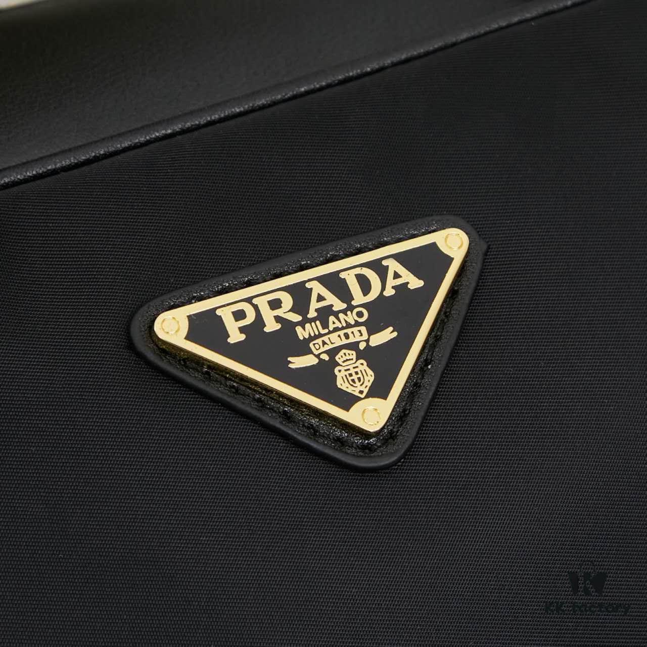 6930b7b96e68136f4d9ae23d Prada 2024 Fall/Winter Black Re-Nylon and Leather Lock Detail Shoulder Bag