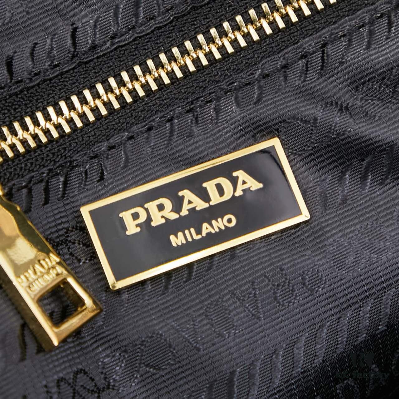 6930b7bc6e68136f4d9ae241 Prada 2024 Fall/Winter Black Re-Nylon and Leather Lock Detail Shoulder Bag