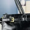 6930b7d86e68136f4d9ae273 PRADA New Arrival: Vintage Style Top-Grain Leather Handbag in Black Waxed Finish, Model No. 426