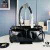 6930b7da6e68136f4d9ae277 PRADA New Arrival: Vintage Style Top-Grain Leather Handbag in Black Waxed Finish, Model No. 426