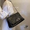 6930b8406e68136f4d9ae331 Prada Re-Edition Nylon Shoulder Bag in Black and Silver – Vintage Charm with Iconic Logo