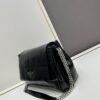 6930b8426e68136f4d9ae336 Prada Re-Edition Shoulder Bag in Black and Silver – Cool Enough to Steal Your Heart!