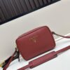 6930b8a86e68136f4d9ae3ef PRADA Double-Strap Camera Bag