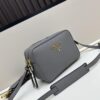 6930b8ad6e68136f4d9ae3f9 PRADA Dual-Strap Camera Bag in Imported Full-Grain Coarse Crisped Calfskin