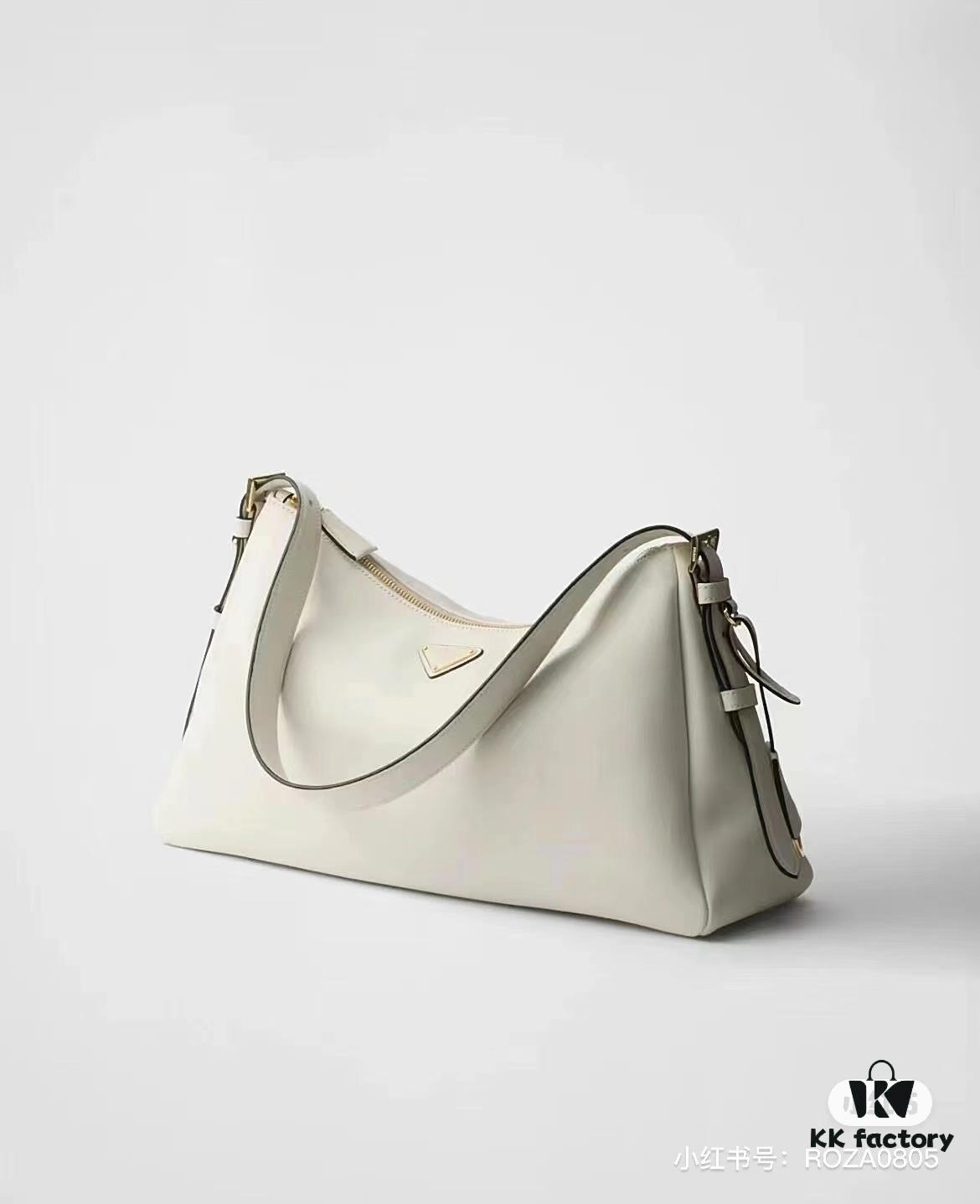 6930b8d76e68136f4d9ae44a Prada's Latest Hobo Shoulder Bag in Smooth Calfskin Leather