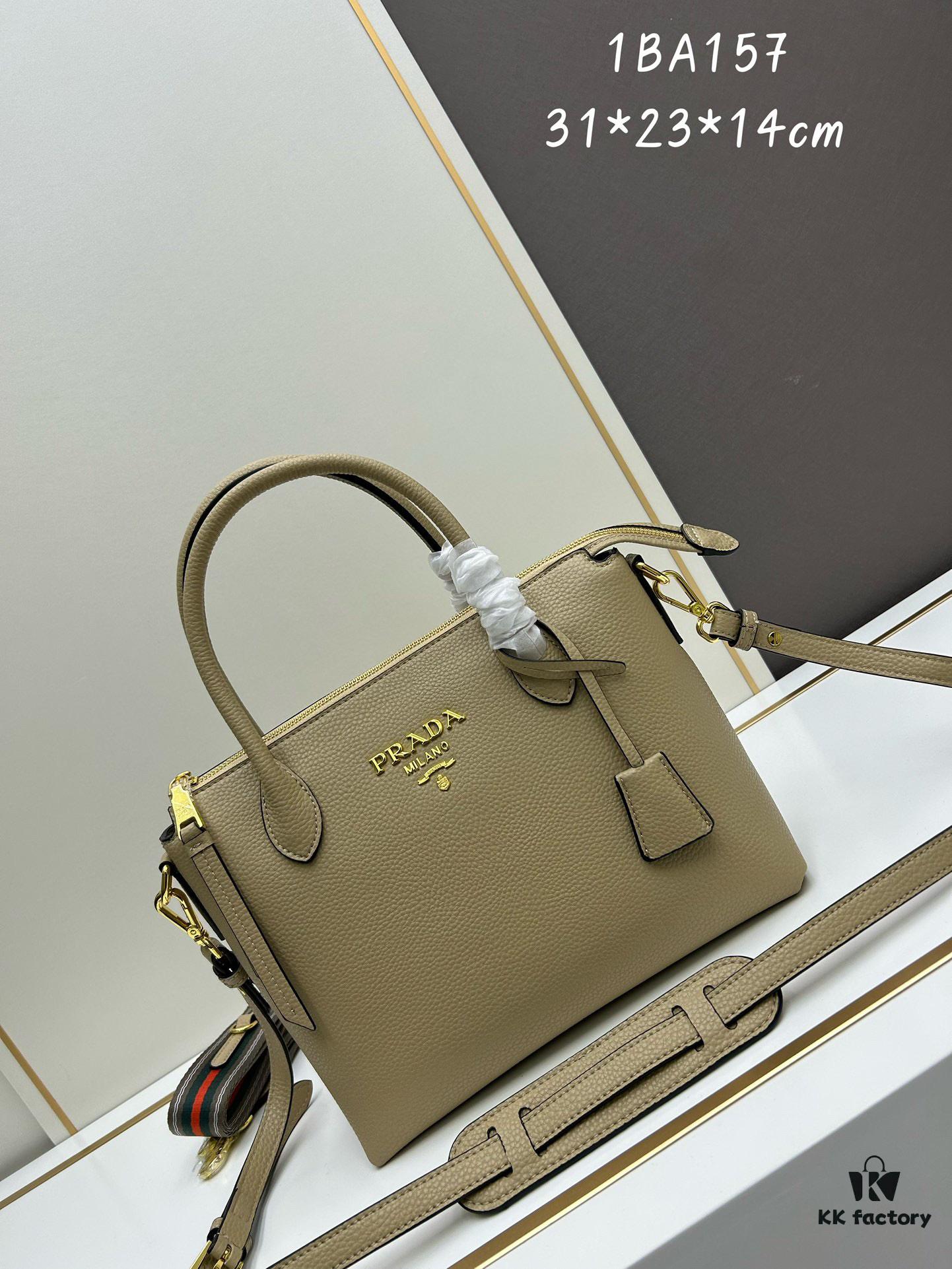 6930b9016e68136f4d9ae496 PRADA Classic Reissue Leather Bag with Dual Shoulder Straps, Calfskin with Jacquard Logo Lining, Gold-Tone Hardware, Removable Adjustable Leather and Colorful Fabric Straps