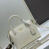 6930b9016e68136f4d9ae497 PRADA Classic Reissue Leather Bag with Dual Shoulder Straps, Calfskin with Jacquard Logo Lining, Gold-Tone Hardware, Removable Adjustable Leather and Colorful Fabric Straps