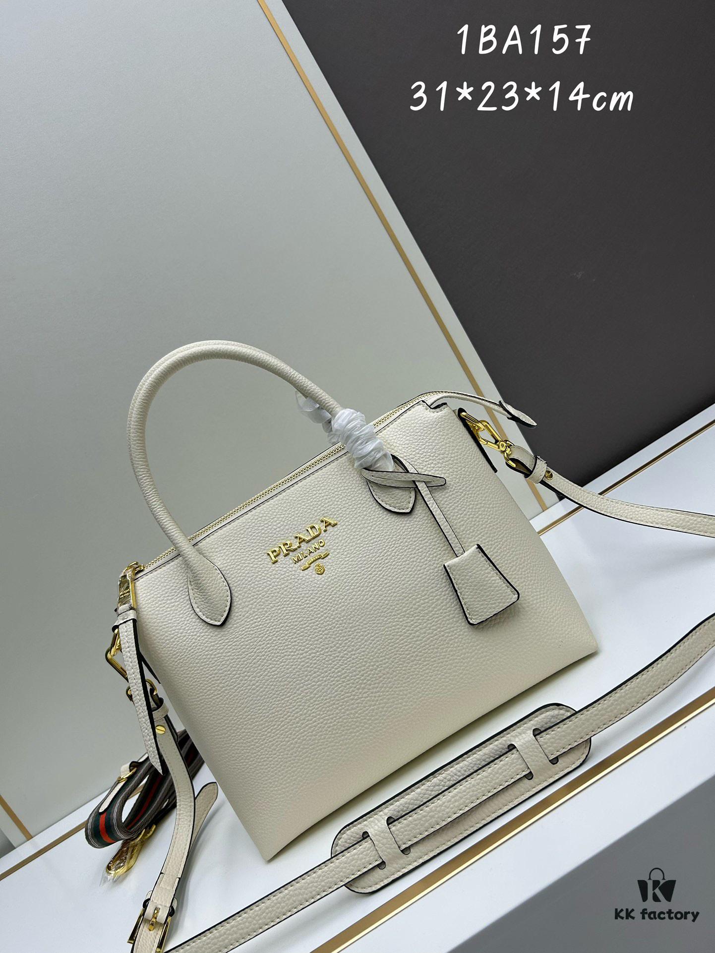 6930b9016e68136f4d9ae497 PRADA Classic Reissue Leather Bag with Dual Shoulder Straps, Calfskin with Jacquard Logo Lining, Gold-Tone Hardware, Removable Adjustable Leather and Colorful Fabric Straps