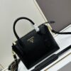 6930b9016e68136f4d9ae498 PRADA Classic Reissue Leather Bag with Dual Shoulder Straps, Calfskin with Jacquard Logo Lining, Gold-Tone Hardware, Removable Adjustable Leather and Colorful Fabric Straps