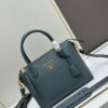 6930b9026e68136f4d9ae499 PRADA Classic Reissue Leather Bag with Dual Shoulder Straps, Calfskin with Jacquard Logo Lining, Gold-Tone Hardware, Removable Adjustable Leather and Colorful Fabric Straps