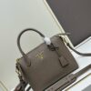 6930b9026e68136f4d9ae49b PRADA Classic Reissue Leather Bag with Dual Shoulder Straps, Calfskin with Jacquard Logo Lining, Gold-Tone Hardware, Removable Adjustable Leather and Colorful Fabric Straps