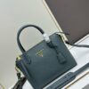 6930b90e6e68136f4d9ae4aa PRADA Classic Reissue Leather Bag with Double Handles and Detachable Adjustable Straps