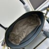 6930b9106e68136f4d9ae4b1 PRADA Classic Reissue Leather Bag with Double Handles and Detachable Adjustable Straps