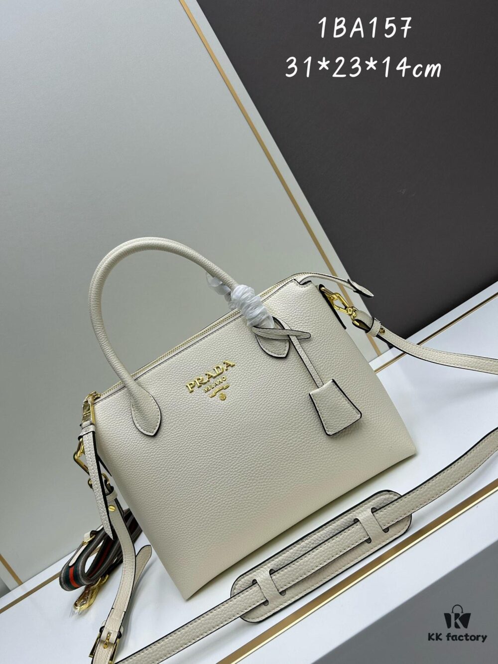 PRADA Classic Reissue Leather Bag with Dual Shoulder Straps, Calfskin, Double Top Handles, Removable Adjustable Leather Strap, Removable Adjustable Colorful Fabric Strap, Gold-Tone Hardware, Engraved Metal Logo, Zip Closure, Two Interior Pockets, Jacquard PRADA Logo Lining