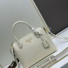 6930b9156e68136f4d9ae4b7 PRADA Classic Reissue Leather Bag with Dual Shoulder Straps, Calfskin, Double Top Handles, Removable Adjustable Leather Strap, Removable Adjustable Colorful Fabric Strap, Gold-Tone Hardware, Engraved Metal Logo, Zip Closure, Two Interior Pockets, Jacquard PRADA Logo Lining