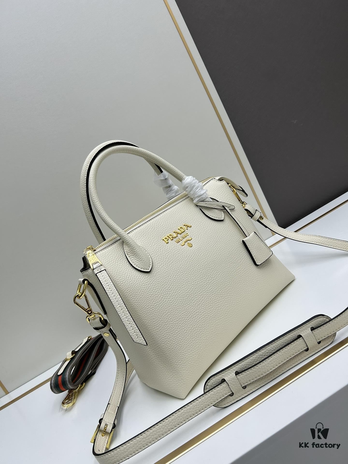 6930b9166e68136f4d9ae4bb PRADA Classic Reissue Leather Bag with Dual Shoulder Straps, Calfskin, Double Top Handles, Removable Adjustable Leather Strap, Removable Adjustable Colorful Fabric Strap, Gold-Tone Hardware, Engraved Metal Logo, Zip Closure, Two Interior Pockets, Jacquard PRADA Logo Lining