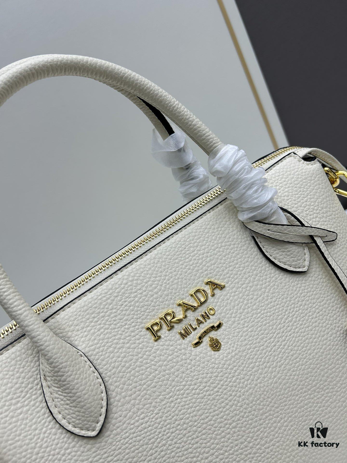 6930b9166e68136f4d9ae4bc PRADA Classic Reissue Leather Bag with Dual Shoulder Straps, Calfskin, Double Top Handles, Removable Adjustable Leather Strap, Removable Adjustable Colorful Fabric Strap, Gold-Tone Hardware, Engraved Metal Logo, Zip Closure, Two Interior Pockets, Jacquard PRADA Logo Lining