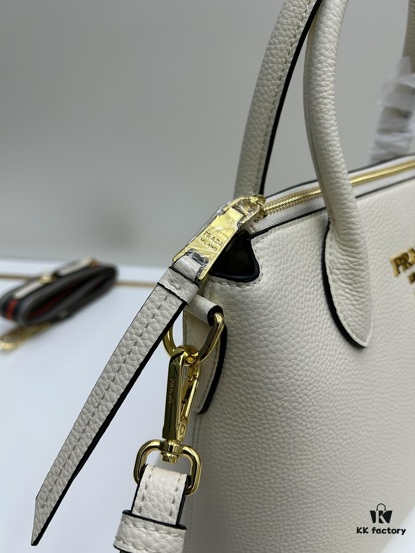 6930b91a6e68136f4d9ae4c0 PRADA Classic Reissue Leather Bag with Dual Shoulder Straps, Calfskin, Double Top Handles, Removable Adjustable Leather Strap, Removable Adjustable Colorful Fabric Strap, Gold-Tone Hardware, Engraved Metal Logo, Zip Closure, Two Interior Pockets, Jacquard PRADA Logo Lining
