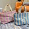 6930b9296e68136f4d9ae4d9 Prada Woven Straw Letter Bag in Black, Beige, Pink, Blue - Vacation Style Cute Handheld Bag with Triangular Logo