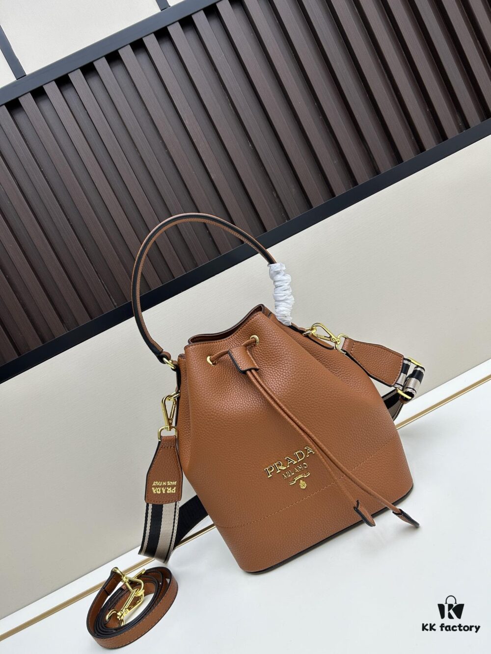 Prada New Arrival, Calfskin Leather with Pebbled Texture, Comes with Two Shoulder Straps – One Leather Strap and One Colorful Woven Strap for Stylish Versatility