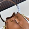 6930b9666e68136f4d9ae535 Prada New Arrival, Calfskin Leather with Pebbled Texture, Comes with Two Shoulder Straps – One Leather Strap and One Colorful Woven Strap for Stylish Versatility