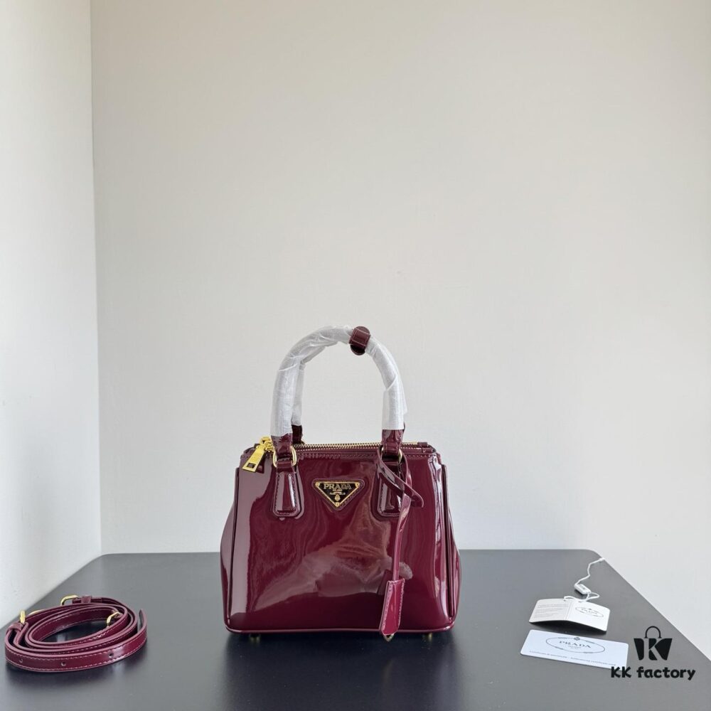 6930b9ab6e68136f4d9ae5ad Prada Patent Leather Top Handle Crossbody Bag