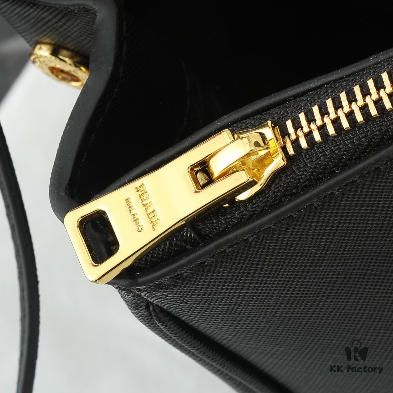 6930b9dd6e68136f4d9ae5fd House Super Hot Killer Bag, Saffiano Leather, Dual Top Handles, Detachable Adjustable Leather Shoulder Strap, Gold-Tone Hardware, Triangle Logo with Metal Lettering on Leather, Snap Button Closure on Side, Two Outer Zip Pockets, Three Interior Pockets Including One with Zipper, Prada-Branded Lining