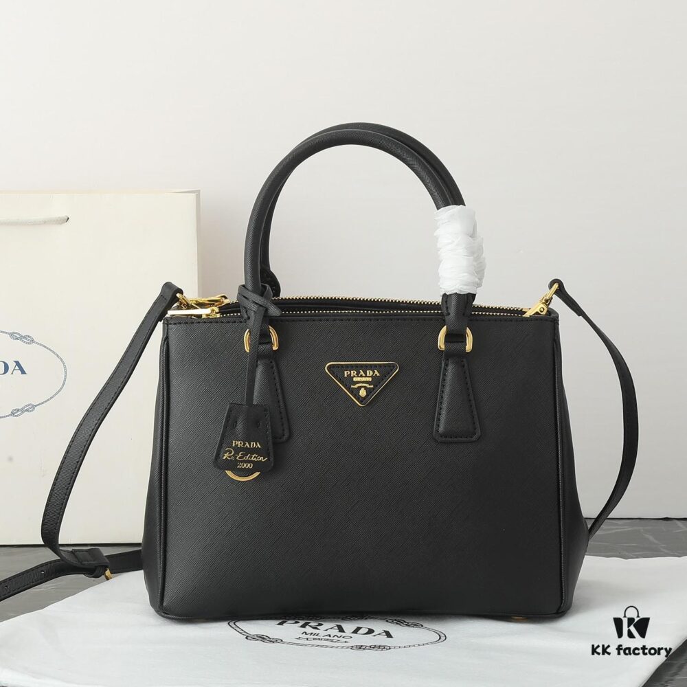 6930b9ea6e68136f4d9ae611 House Super Hot Killer Bag, Saffiano Leather, Dual Top Handles, Detachable Adjustable Leather Shoulder Strap, Gold-Tone Hardware, Triangle Logo with Metal Lettering on Leather, Snap Button Closure on Side, Two Outer Zip Pockets, Three Interior Pockets Including One with Zipper, Prada-Branded Lining