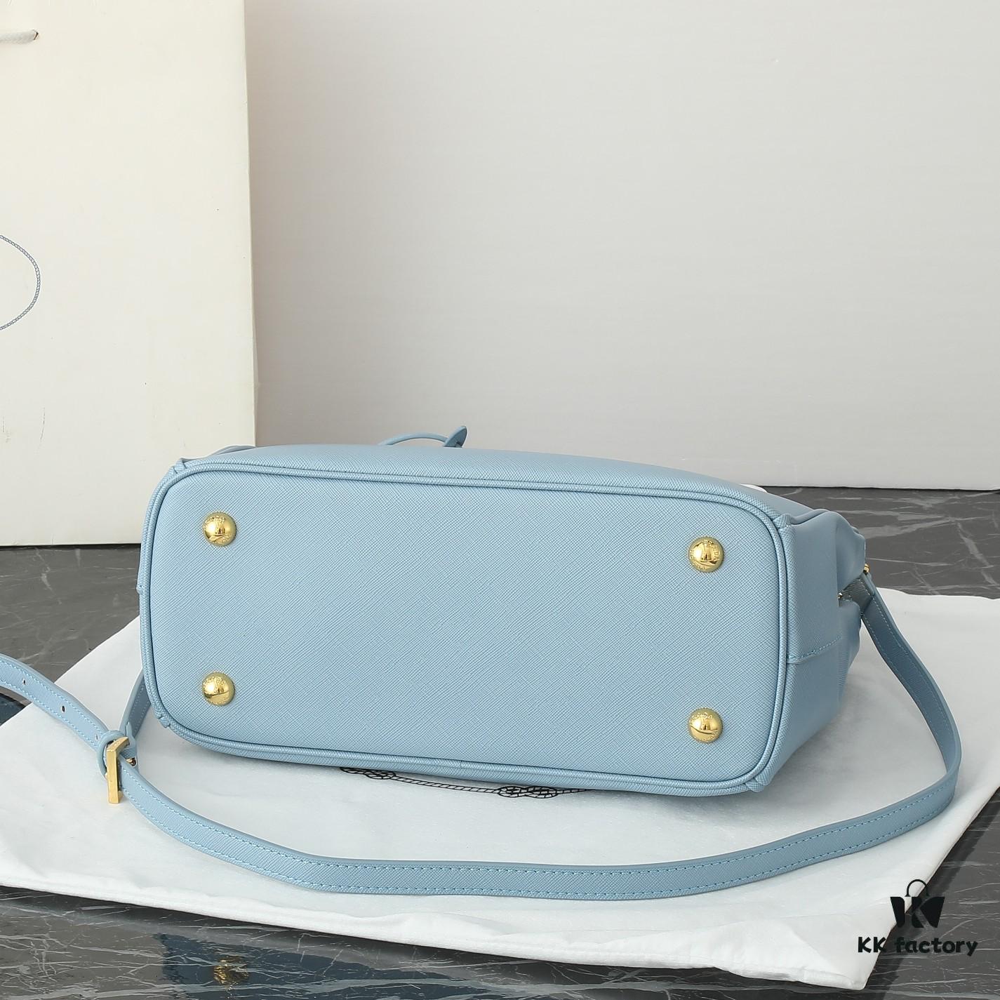 6930b9ed6e68136f4d9ae616 Model 1018 Home Super Hot Killer Bag, Saffiano Leather with Dual Top Handles, Detachable Adjustable Leather Shoulder Strap, Gold-Plated Hardware, Metal Logo Lettering on Triangular Leather Patch, Snap Button Closure on Side, Two Exterior Zip Pockets, Three Interior Pockets Including One Zip Pocket, Prada-Branded Lining