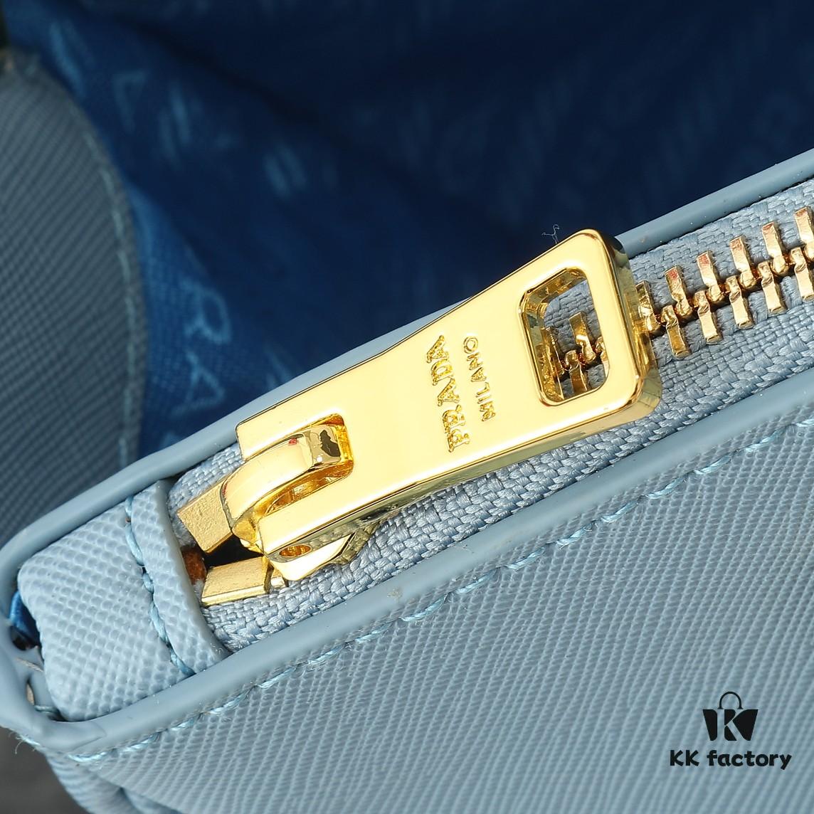 6930b9ee6e68136f4d9ae618 Model 1018 Home Super Hot Killer Bag, Saffiano Leather with Dual Top Handles, Detachable Adjustable Leather Shoulder Strap, Gold-Plated Hardware, Metal Logo Lettering on Triangular Leather Patch, Snap Button Closure on Side, Two Exterior Zip Pockets, Three Interior Pockets Including One Zip Pocket, Prada-Branded Lining