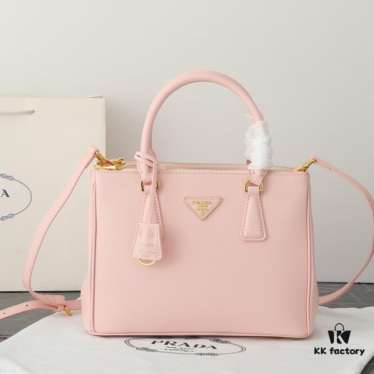 6930b9ef6e68136f4d9ae619 Model 1018 House Super Hot Killer Bag, Saffiano Leather with Dual Top Handles, Detachable Adjustable Leather Shoulder Strap, Gold-Tone Hardware, Metal Logo on Triangular Leather Patch, Snap Button Closure on Side, Two Zippered Outer Pockets, Three Interior Pockets Including One Zippered Compartment, Prada-Branded Lining