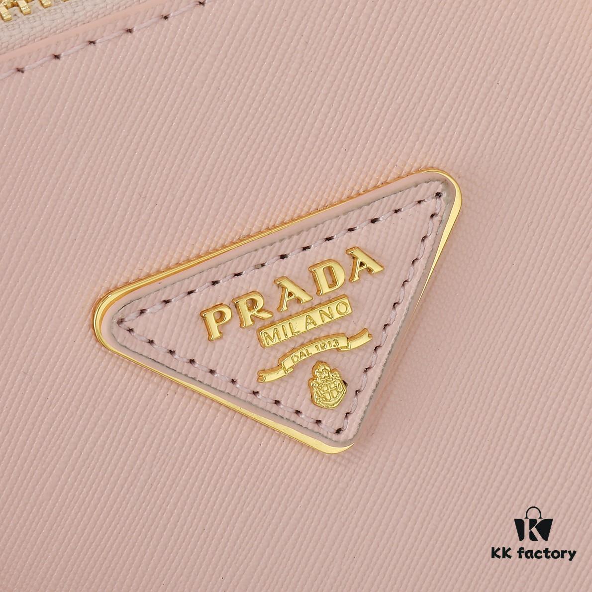 6930b9f06e68136f4d9ae61b Model 1018 House Super Hot Killer Bag, Saffiano Leather with Dual Top Handles, Detachable Adjustable Leather Shoulder Strap, Gold-Tone Hardware, Metal Logo on Triangular Leather Patch, Snap Button Closure on Side, Two Zippered Outer Pockets, Three Interior Pockets Including One Zippered Compartment, Prada-Branded Lining