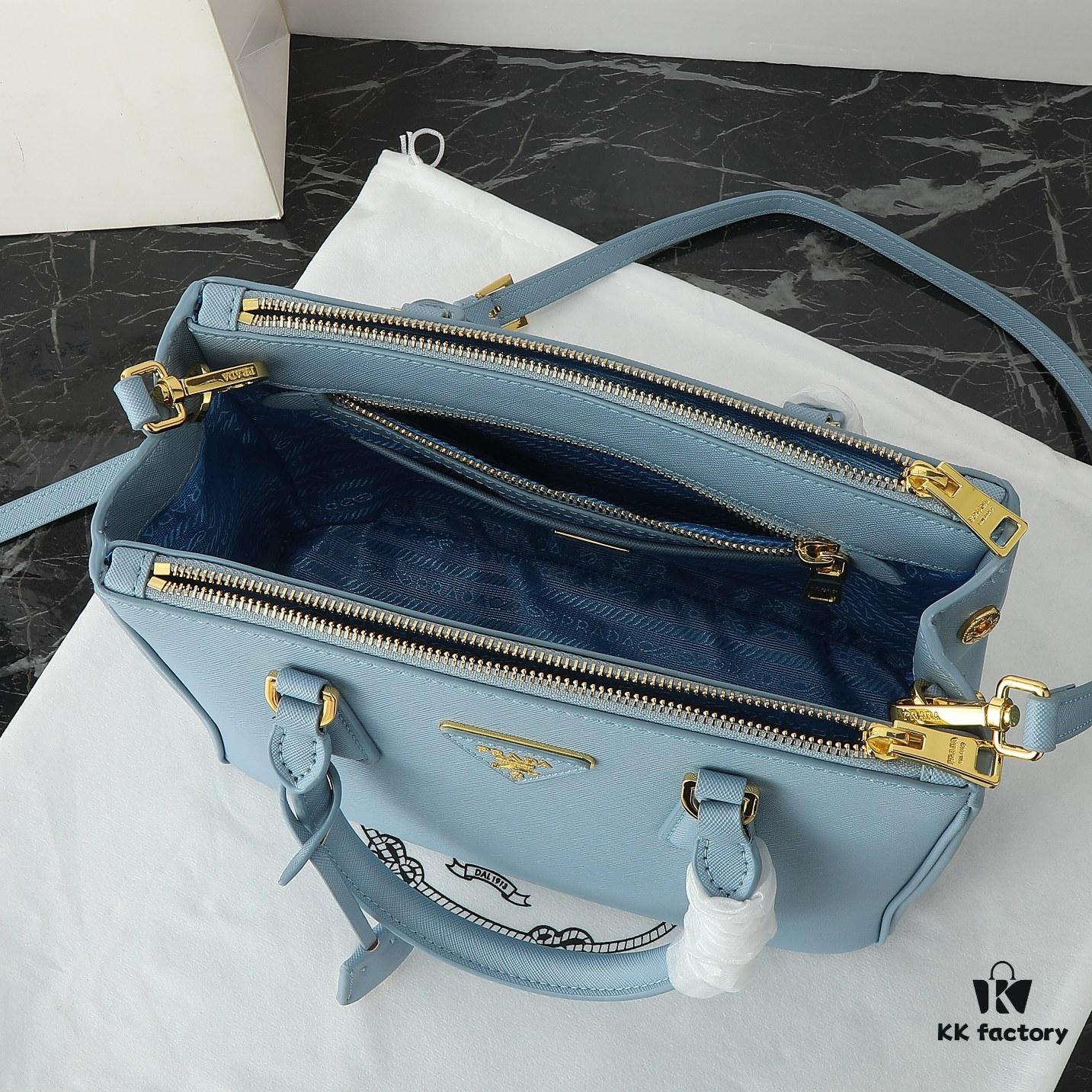 6930b9f06e68136f4d9ae61c Model 1018 Home Super Hot Killer Bag, Saffiano Leather with Dual Top Handles, Detachable Adjustable Leather Shoulder Strap, Gold-Plated Hardware, Metal Logo Lettering on Triangular Leather Patch, Snap Button Closure on Side, Two Exterior Zip Pockets, Three Interior Pockets Including One Zip Pocket, Prada-Branded Lining