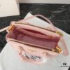 6930b9f06e68136f4d9ae61d Model 1018 House Super Hot Killer Bag, Saffiano Leather with Dual Top Handles, Detachable Adjustable Leather Shoulder Strap, Gold-Tone Hardware, Metal Logo on Triangular Leather Patch, Snap Button Closure on Side, Two Zippered Outer Pockets, Three Interior Pockets Including One Zippered Compartment, Prada-Branded Lining